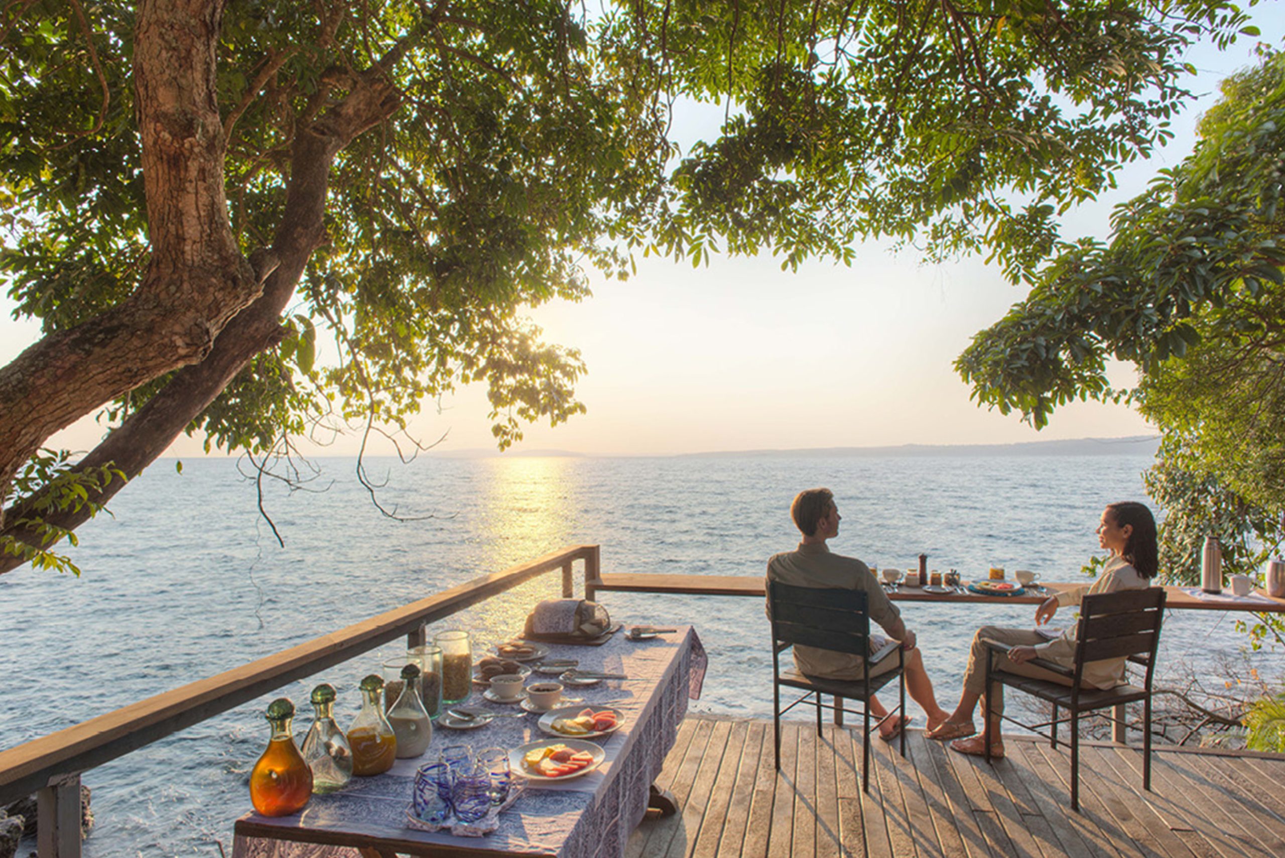 rubondo_island_camp_-_breakfast_deck_overlooking_lake_victoria Couple having breakfast overlooking Lake Victoria, one of Tanzania's most beautiful lakes
